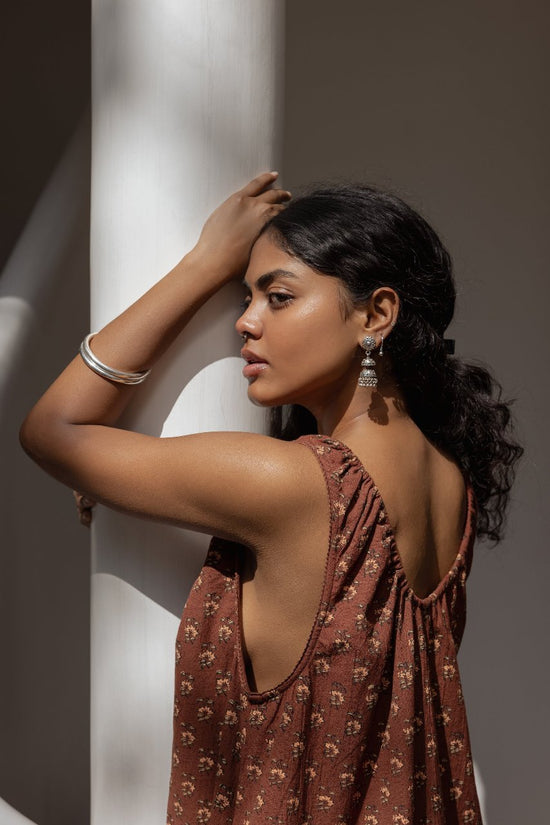 Sundress Mini Almond — waist and hem detail close-up, gathered fabric at waist, warm almond cotton hand block print pattern, artisan Jaipur India | Daughters of India