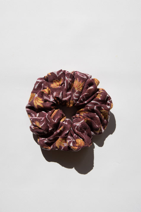 Daughters of India Upcycled Scrunchie in Sumac, a deep burgundy-purple hair scrunchie made from upcycled cotton fabric